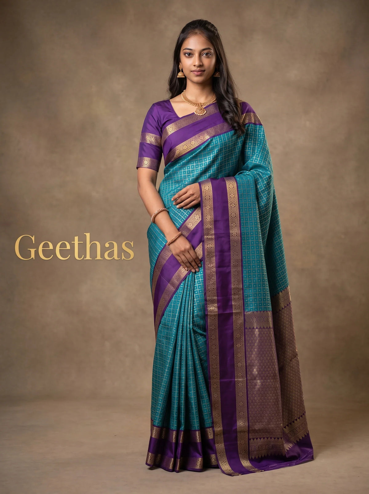 Model wearing teal blue soft silk saree with deep purple zari border and pallu